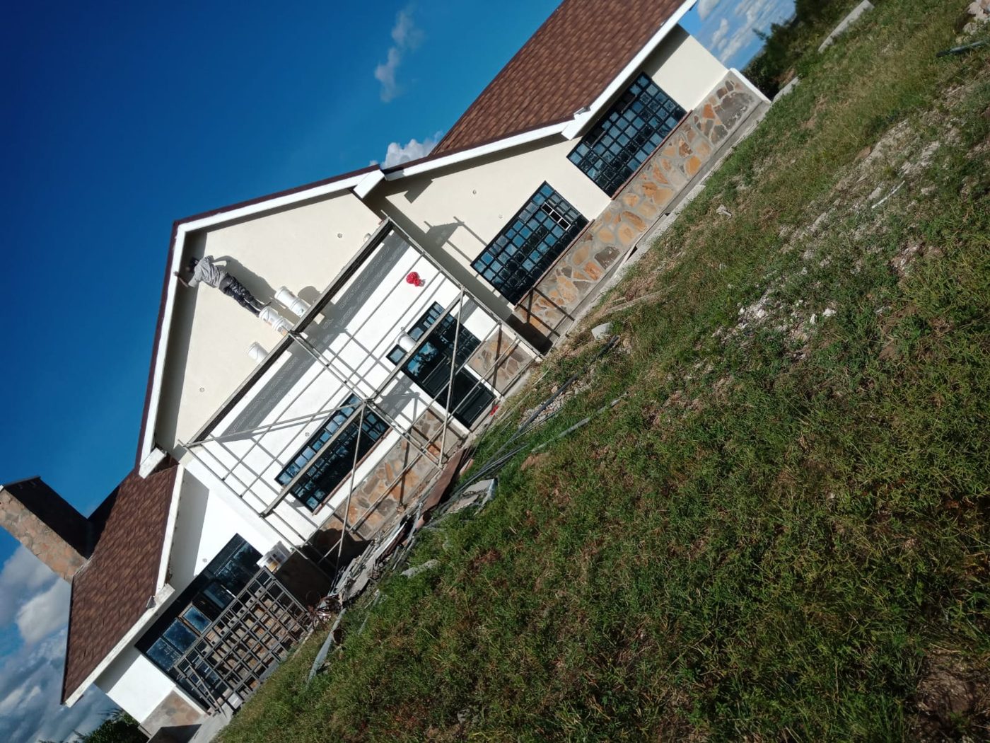 White bungalow with dark roof
