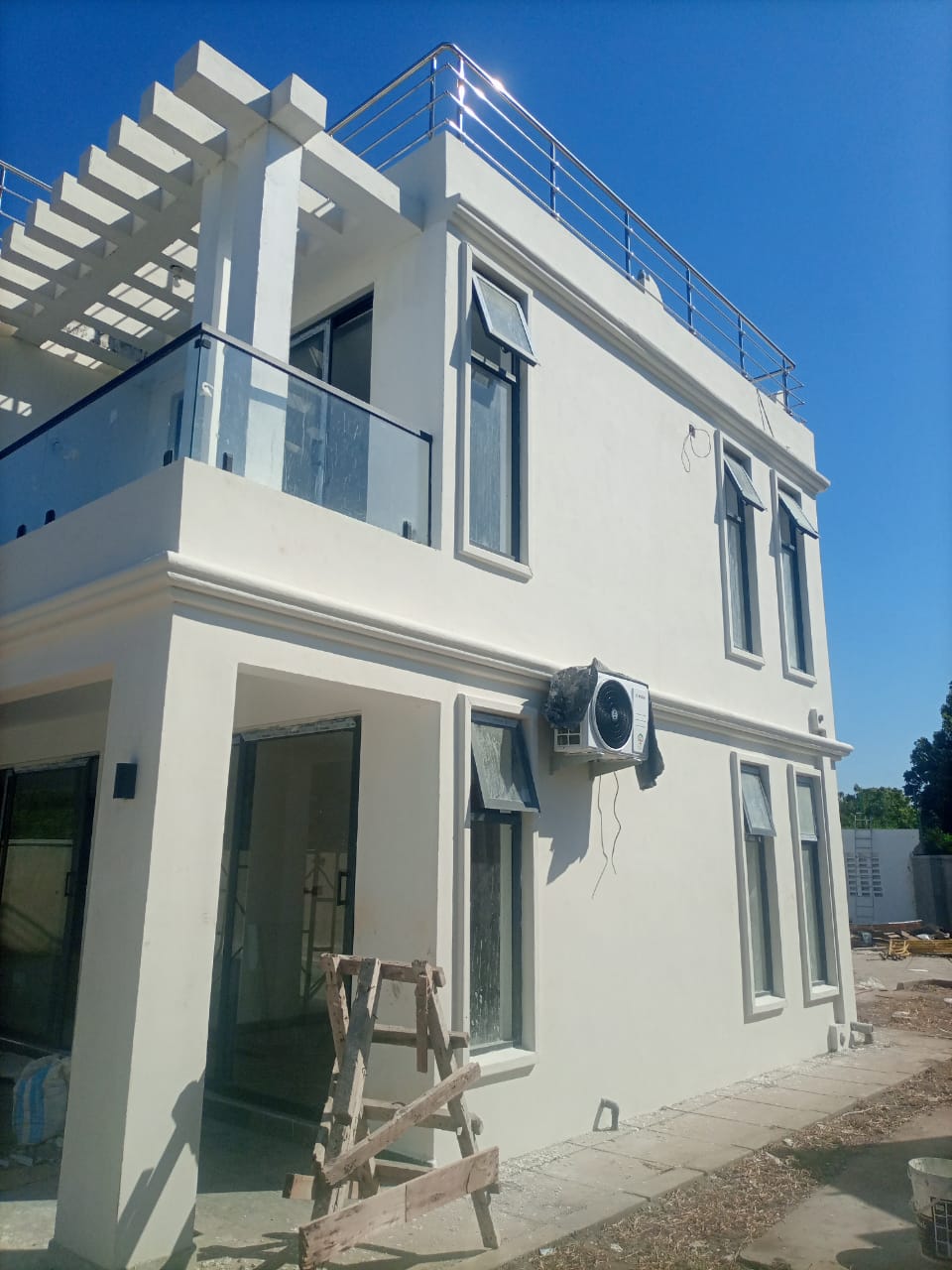 Villa with glass balcony